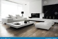 Minimalist Living Room with Sleek White Sofa and Black Coffee Table ...