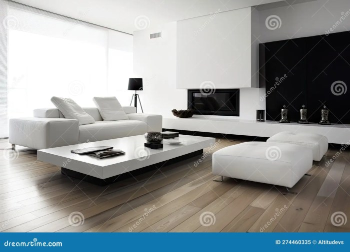 Minimalist Living Room with Sleek White Sofa and Black Coffee Table ... Minimalist Living Room with Sleek White Sofa and Black Coffee Table ...